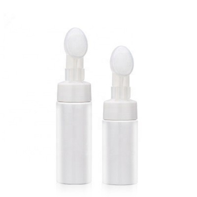 42mm plastic foaming soap pump with soft silicone brush used for face cleaning